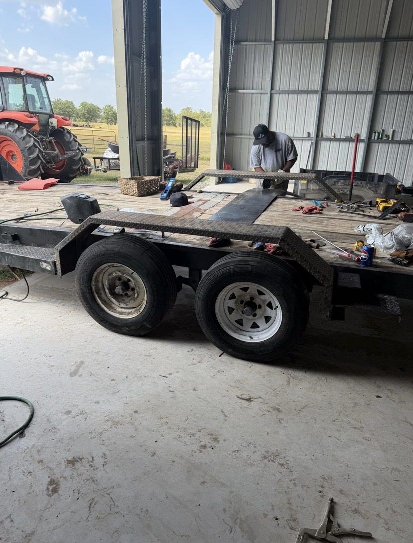 Welding a 3/16 inch tread plate drive over trailer fender onto a car hauler trailer deck